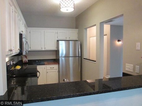 Kitchen with all stainless appliances - 7540 Edinborough Way