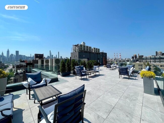 Building Photo - 21-59 44th Drive 2C