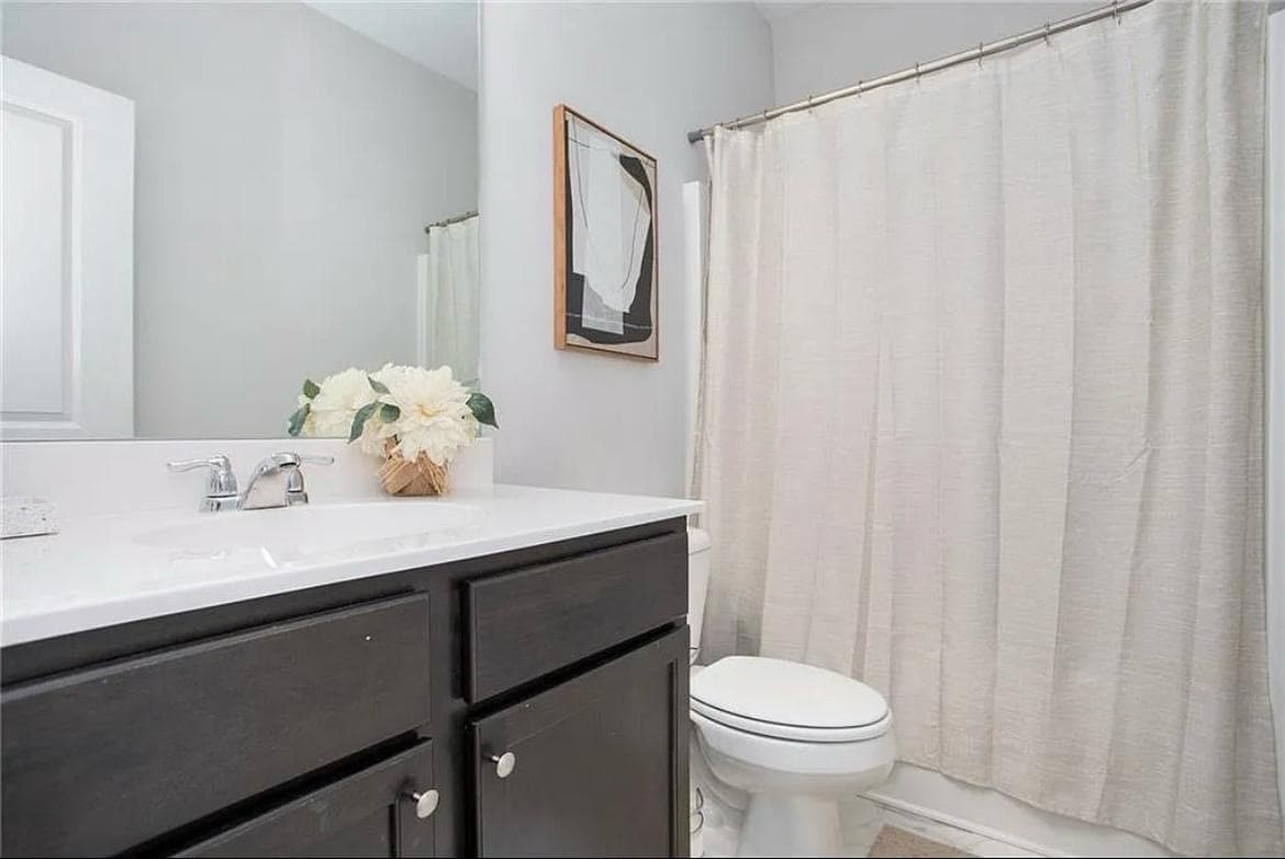 Bathroom upstairs - 1961 James Red Moore Blvd