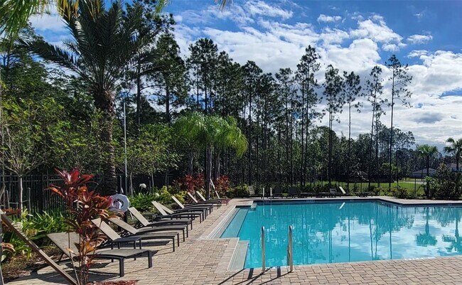 Building Photo - 5126 Magnolia Palm Dr