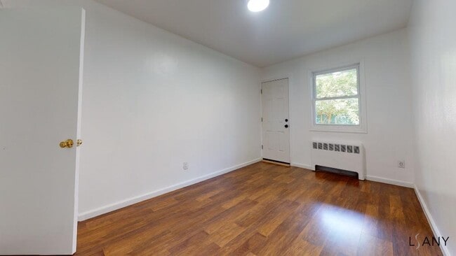 Building Photo - FULLY RENOVATED 1BR IN PRIVATE HOME. HEAT AND HOT WATER INCLUDED! JUNE 2026