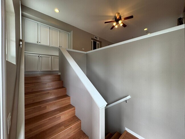 Building Photo - Sleek 2-Bed with a Den/Office + Flex Corner Condo with Attached Tandem Garage