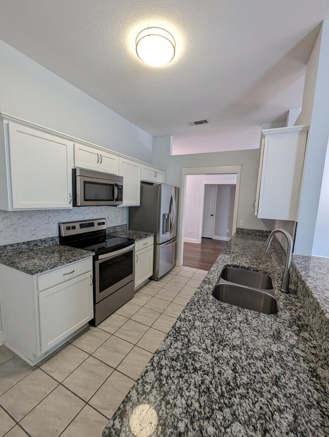 Building Photo - 9044 Quail Roost Dr