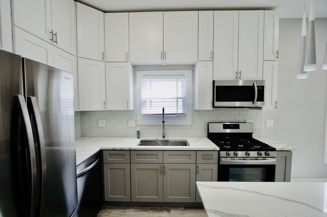 Building Photo - Modern rehabbed 2 Bedroom home with garage