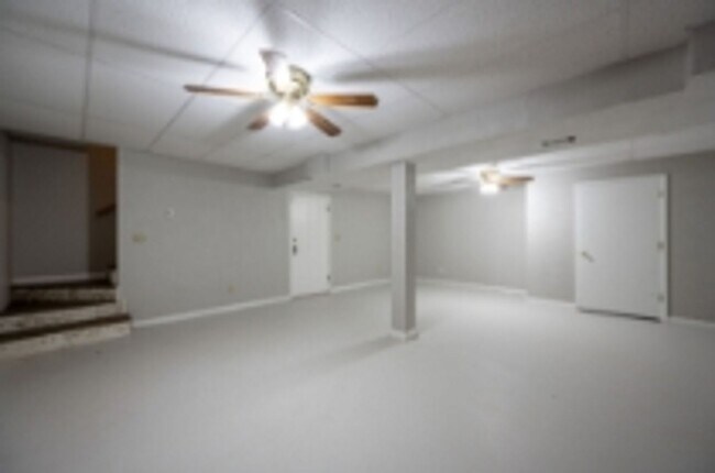 Building Photo - This beautifully updated brick home in Har...
