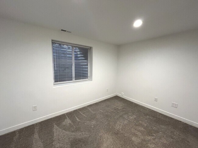 Building Photo - Spacious 5-Bedroom Home with Finished Basement and 3-Car Garage in Wellington