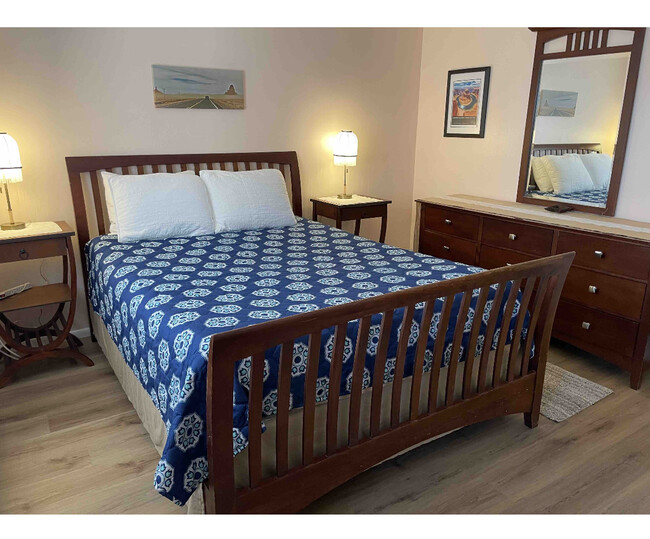 Newly updated master bedroom with soft queen bed and en suite bathroom. Cozy queen bed. - 224 Hopi Ave