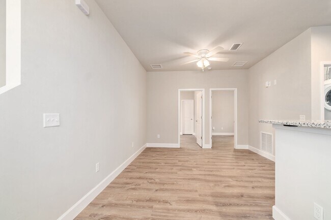 Building Photo - The Reef Townhome NOW LEASING FOR FALL 2026!