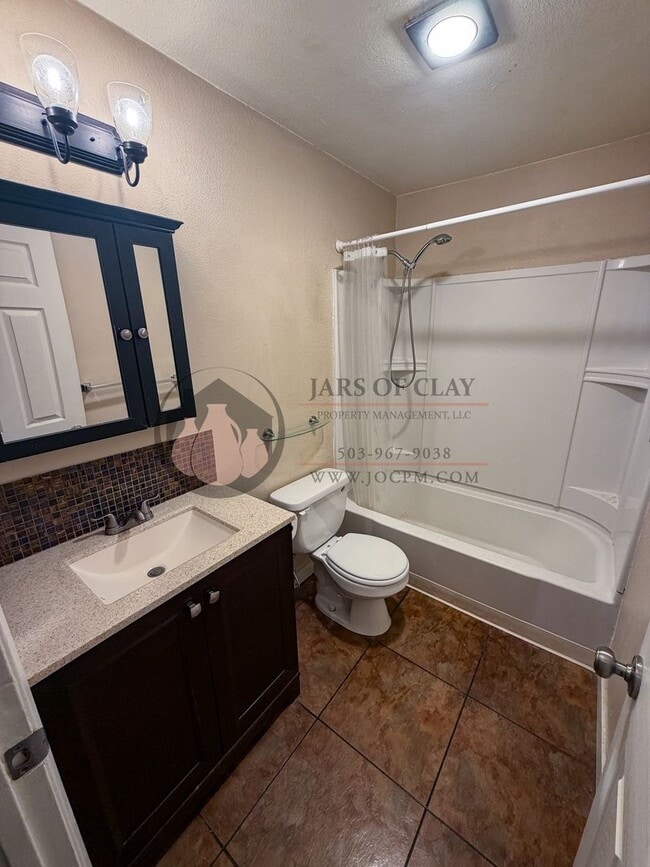 Building Photo - Beaverton Community Living | Dedicated Off-Street Parking & Great Layout