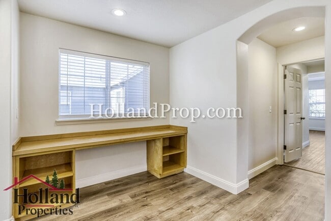 Building Photo - Charming 3-Bedroom Home with Wood Floors, Gas Fireplace & Private Patio