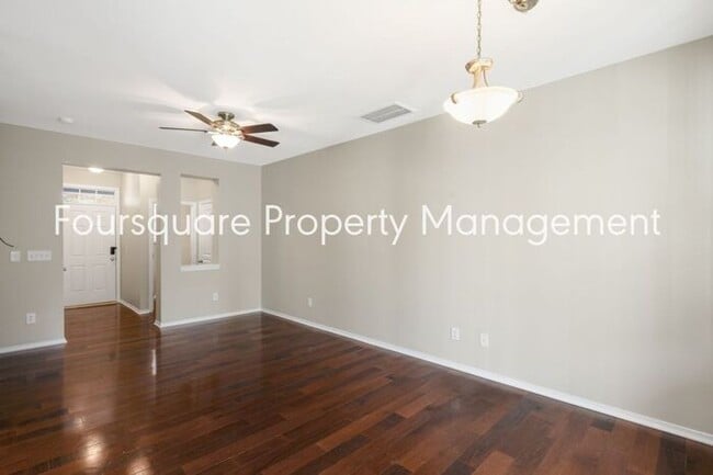 Building Photo - Charming Townhome with Open Layout, Back Patio & One-Car Garage – Near RTP, RDU & Everyday Conven...