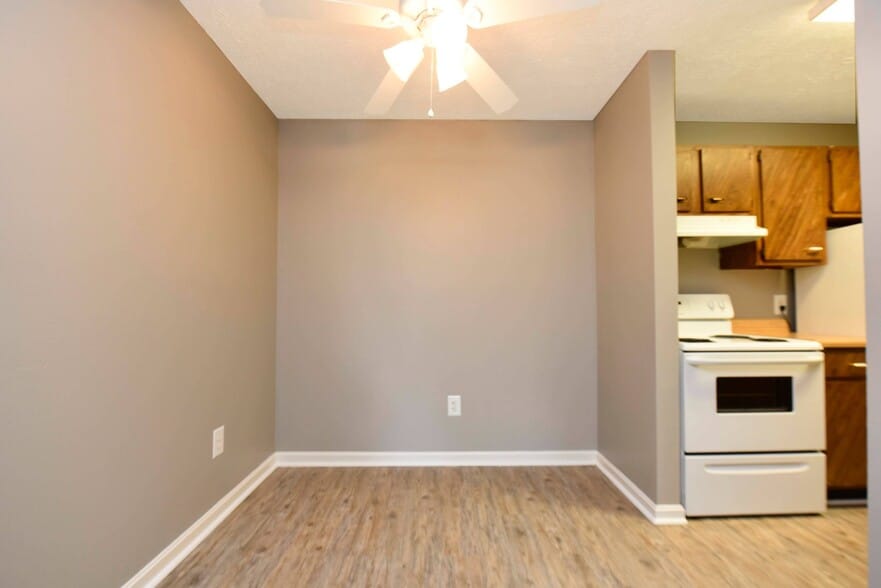 Dining Room + Hardwood Style Flooring - Keystone Apartments