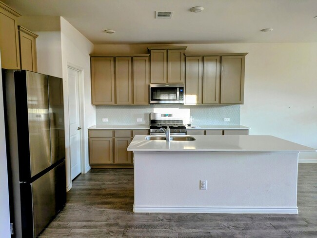 Building Photo - Modern 4-Bedroom Home in Hawks Landing, Au...