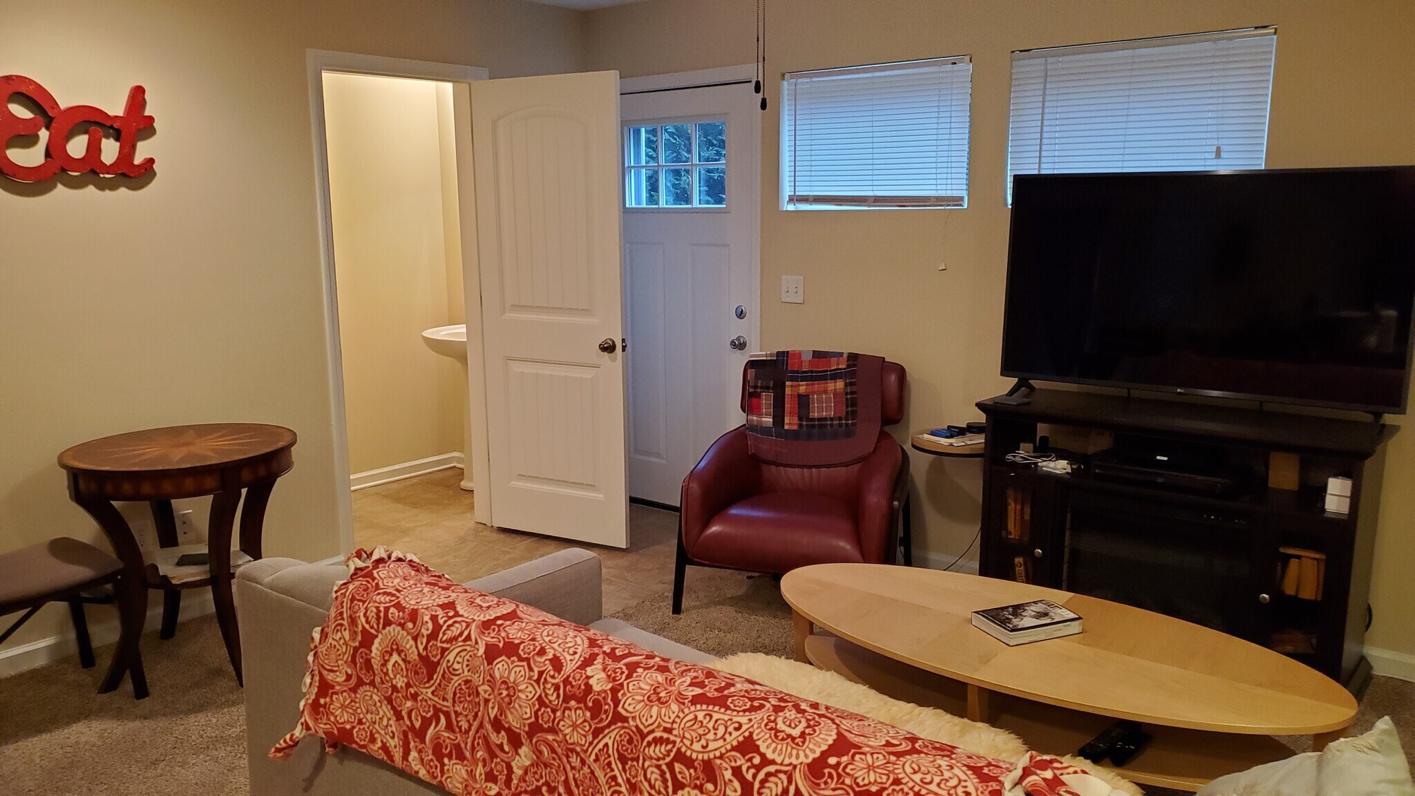 Living Room, with view of Powder room - 304 W 18th St