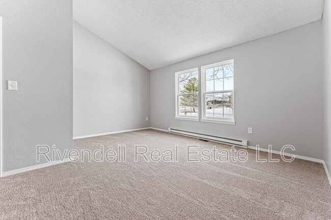 Building Photo - 9695 W Chatfield Ave