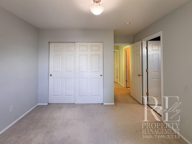 Building Photo - Dual Primary Suites, Huge Backyard Deck & Sun-Filled Living Spaces Near Everyday Conveniences