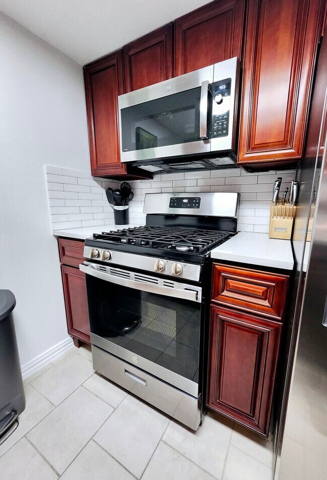 Building Photo - Modern Downtown Living with Comfort, Security & Style