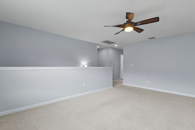 Building Photo - Spacious 4-Bedroom Home in Amelia Walk wit...