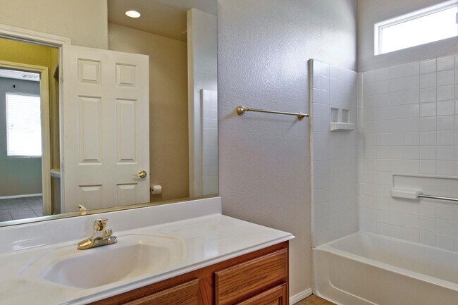 Building Photo - THIS 2 STORY HOME IN A GATED COMMUNITY HAS...