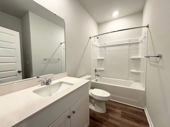 Building Photo - ABSOLUTELY BEAUTIFUL BRAND-NEW BUILD TOWNHOME