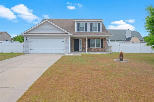 Building Photo - Spacious 5-Bedroom Home with Screened Patio & Private Fenced Yard in Guyton