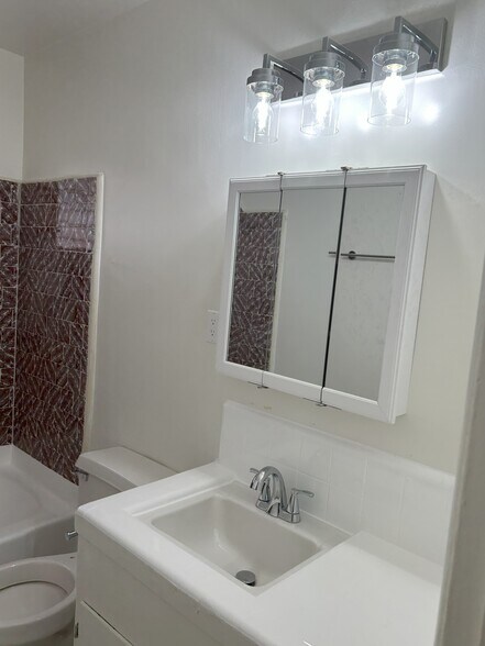 New Medicine Cabinet - 7704 Romaine St