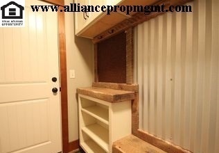 Building Photo - Centrally-located 3 bedroom home with paved RV parking.