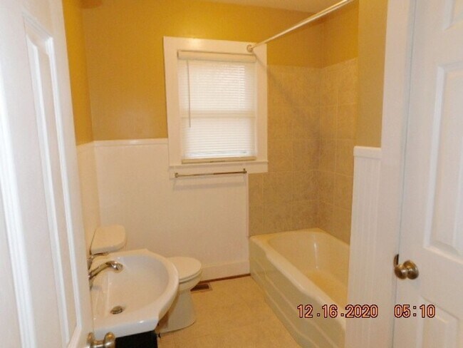 Building Photo - Home with 2 bedrooms, 1 bath, side deck, carport with side porch and detached garage