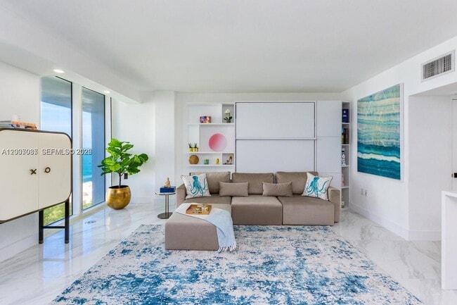 Building Photo - 10275 Collins Ave