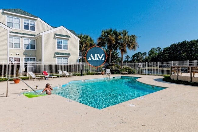 Building Photo - Charming First-Floor Condo with Pond Views at The Estate at Westbury