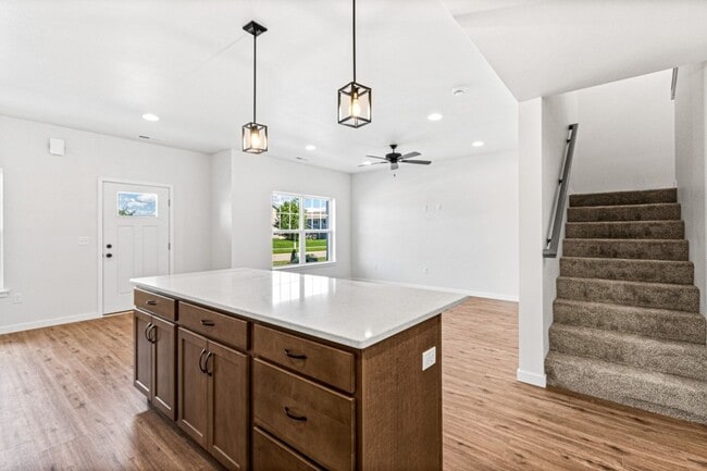 Building Photo - New 3 Bed Townhome with Covered Deck and Oversized Garage!