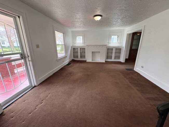 Building Photo - Spacious 4-Bedroom Akron Home with Charming Kitchen Nook & Backyard & Pet Friendly