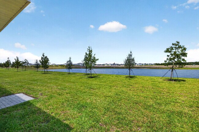 Building Photo - 5876 NW Sweetwood Dr
