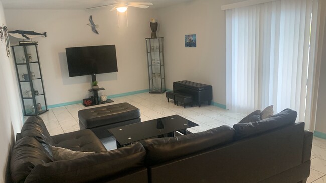 Sofa with Smart TV - 410 SW 47th St