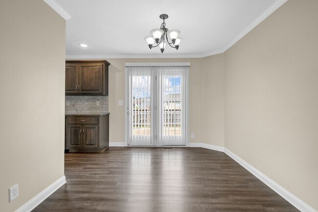Building Photo - Spacious 4-Bedroom Home with Modern Upgrad...