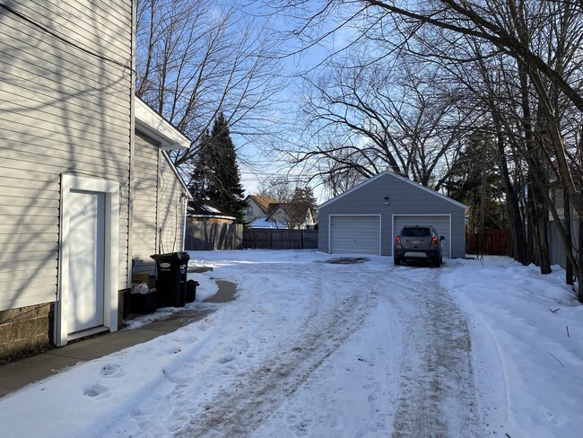 Garage stall on right included, private entrance and separated by wall from other stall - 609 McDonough St