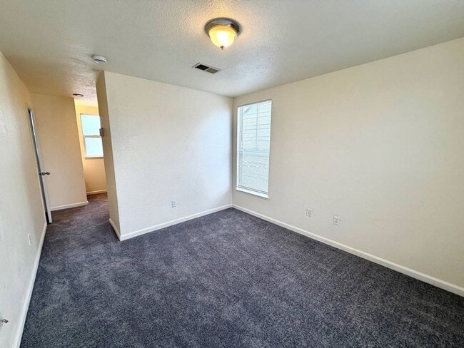 Building Photo - Freshly Painted w/ New Carpets 3 Bedroom, 2 Bath With Attached Garage