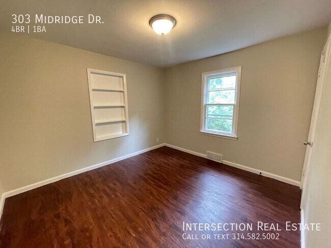 Building Photo - 303 Midridge Dr