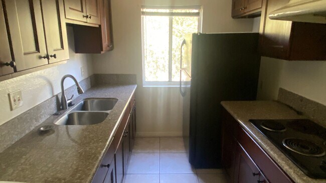 Building Photo - Beautiful Condo in Serene Montebello HOA – Pool, Spa, Prime Location