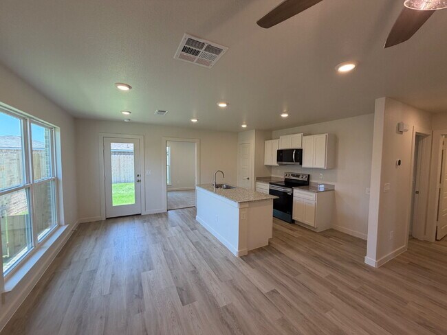Building Photo - New Modern 3 Bedroom Home in Frenship ISD with Garage & Fenced Backyard
