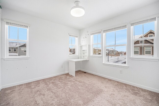 Building Photo - "Spacious 4-Bedroom Duplex Oasis with 3 Full Baths in Erie, CO - Your Perfect Home Awaits!"