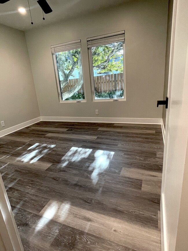 Bedroom with recessed dimmable lighting, ceiling fan, dual pane windows and ceiling fan - 3211 W Alameda Ave