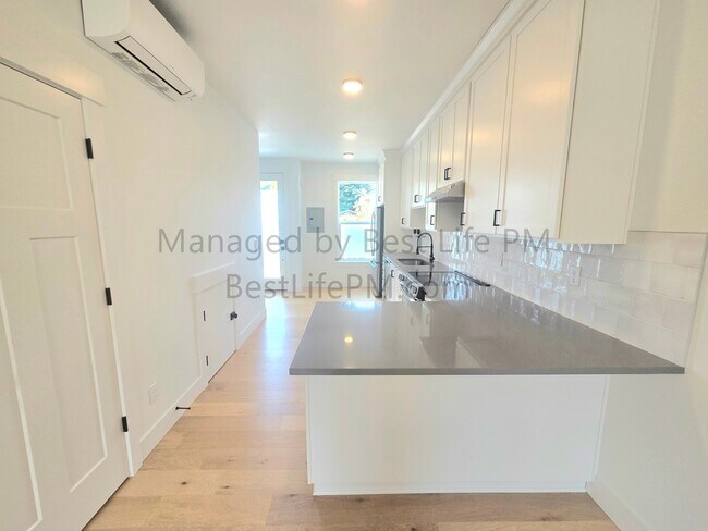 Building Photo - 310 NE 58th Ave