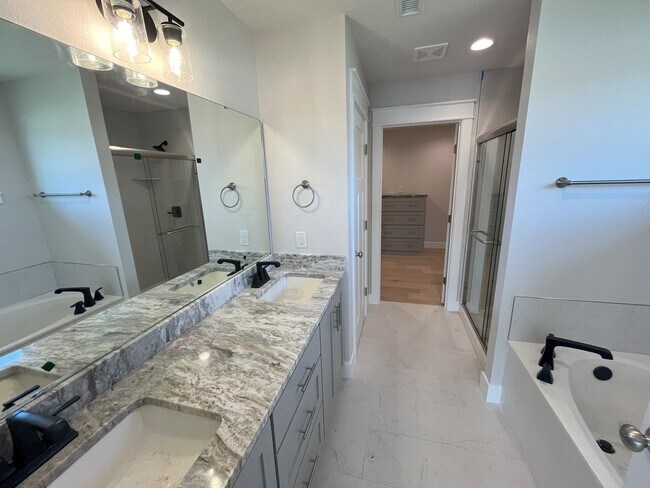 Building Photo - Nearly-new 4-bedroom, 2-bath home in the exclusive Lion's Gate Neighborhood!!!