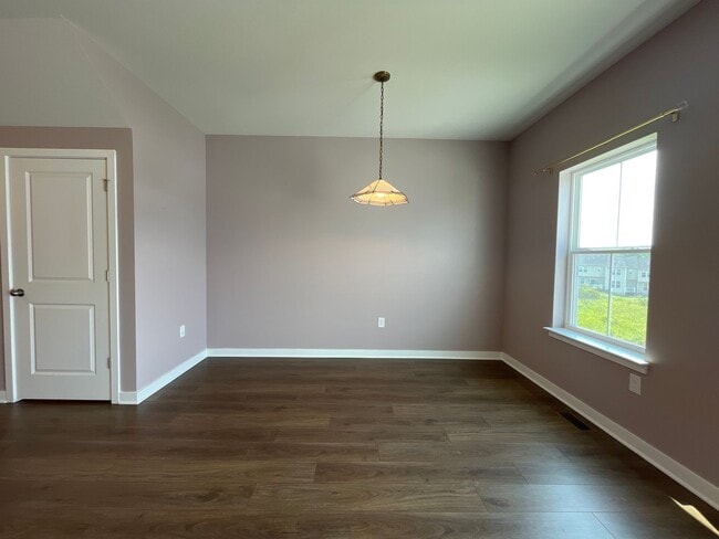 Building Photo - Move-in-ready Brookside Court townhome off...