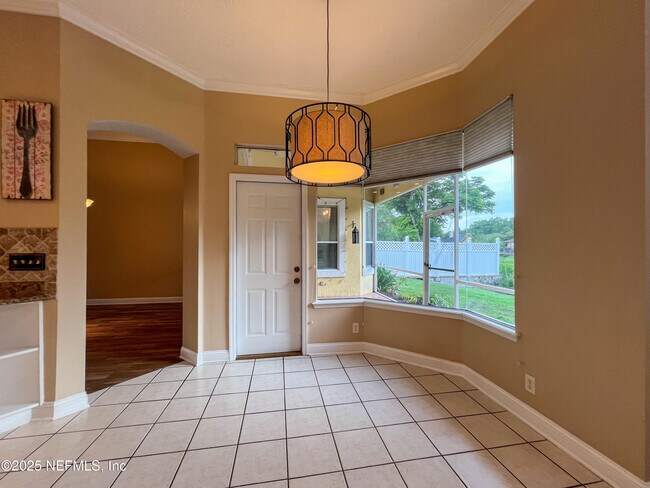 Building Photo - 1704 Tall Tree Dr E