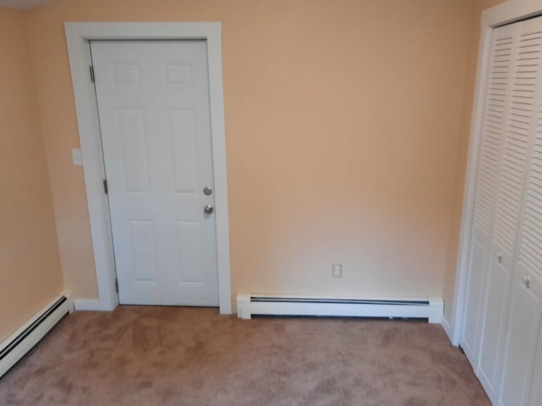 2nd rear door in bedroom opens to covered patio - 86 Forest St