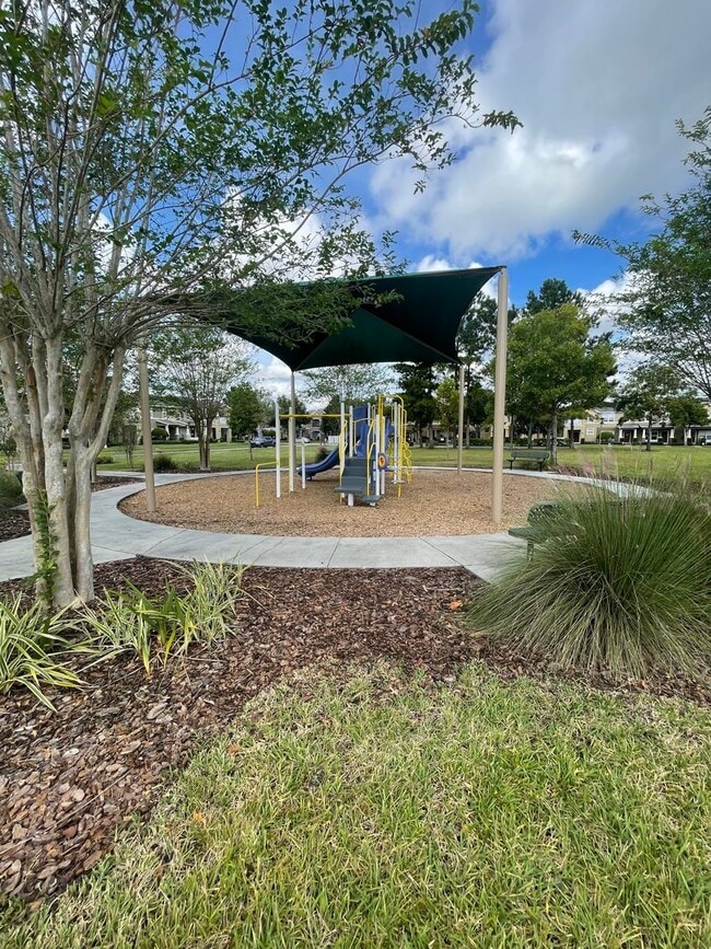 Building Photo - 5 bed / 2.5 bath Lake Nona Townhome!
