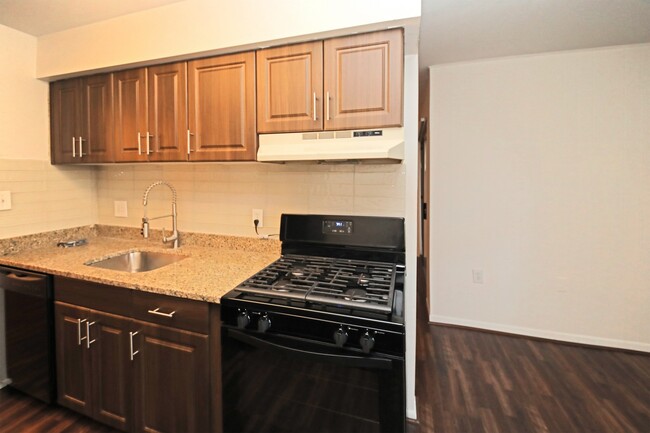 Building Photo - 2br/1.5ba with new laminate flooring, new ...