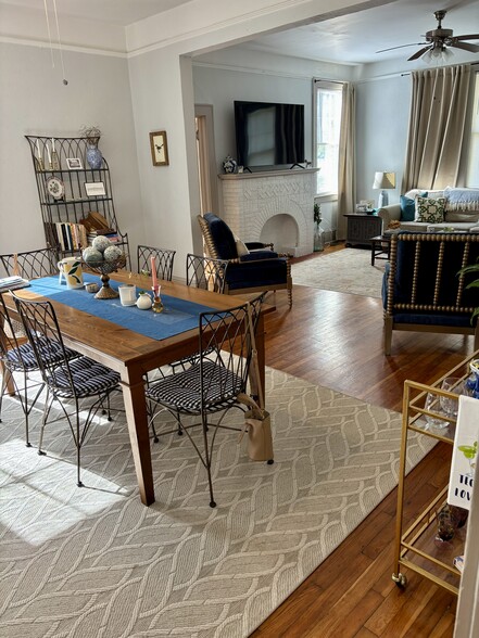 Living room and dining room. Hardwood floors - 1302 E Victory Dr